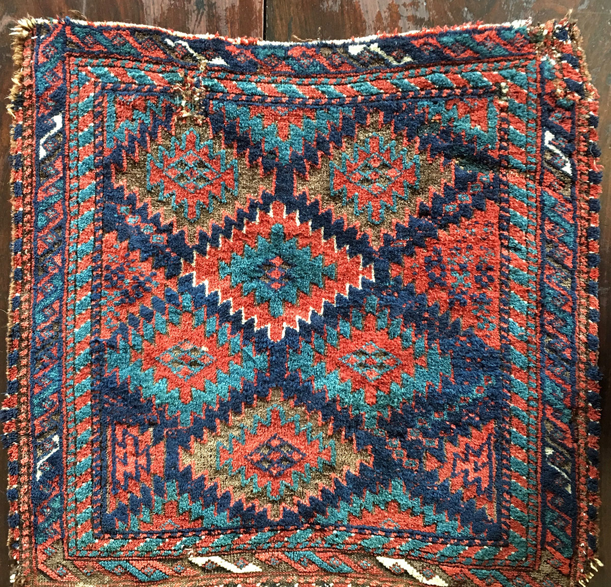 Image of a baluch bag face rug
